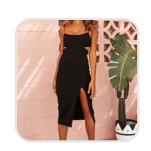 Black cut out dress. New with tags. Size 8